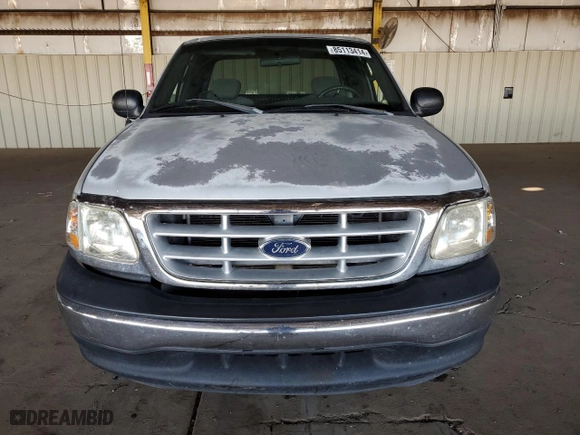 2003 Ford F-150 XL with VIN 1FTRX07233KD43811, listed as a Copart auction lot 85113414 with 215,390 mi miles and Salvage Title. Bid and sale history available at carsss.com. Image 5.