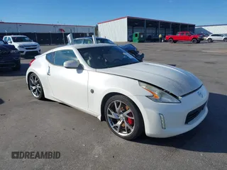2013 Nissan 370Z with VIN JN1AZ4EH4DM380820, listed as a IAAI auction lot 41547638 with 118,222 mi miles. Bid and sale history available at carsss.com. Image 1.