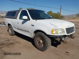 2002 Ford F-150 XL with VIN 1FTRF17282KA85955, listed as a IAAI auction lot 41424999 with 183,700 mi miles and . Bid and sale history available at DreamBid. Image 1.