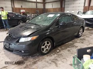 2012 Honda Civic Cpe LX with VIN 2HGFG3B54CH547967, listed as a IAAI auction lot 41083787 with 146,648 mi miles. Bid and sale history available at carsss.com. Image 2.