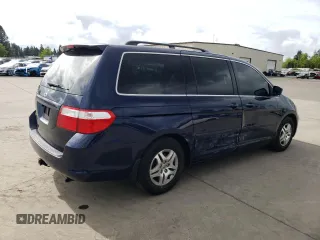 2006 Honda Odyssey EX with VIN 5FNRL38436B089189, listed as a Copart auction lot 57311505 with 165,325 mi miles and Salvage title. Bid and sale history available at DreamBid. Image 3.