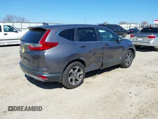 2019 Honda CR-V EX with VIN 5J6RW1H5XKL005682, listed as a IAAI auction lot 41663175 with 91,367 mi miles. Bid and sale history available at carsss.com. Image 4.