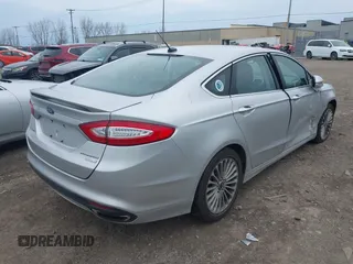 2016 Ford Fusion Titanium with VIN 3FA6P0K93GR117587, listed as a IAAI auction lot 42079701 with 142,105 mi miles. Bid and sale history available at carsss.com. Image 4.