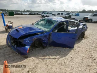 2022 Dodge Charger R/T with VIN 2C3CDXCT7NH231873, listed as a Copart auction lot 61504165 with 58,836 mi miles and Salvage title. Bid and sale history available at DreamBid. Image 1.