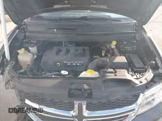 2014 Dodge Journey SE with VIN 3C4PDCAB0ET283756, listed as a IAAI auction lot 41490472 with 122,695 mi miles. Bid and sale history available at carsss.com. Image 10.