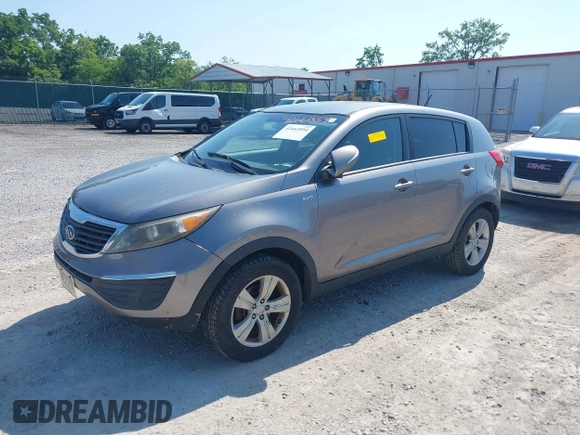 2012 Kia Sportage LX with VIN KNDPBCA28C7237079, listed as a IAAI auction lot 42663554 with 245,420 mi miles and . Bid and sale history available at DreamBid. Image 2.