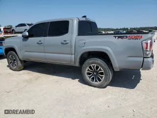2021 Toyota Tacoma 4WD SR with VIN 3TMCZ5AN2MM436040, listed as a Copart auction lot 52879625 with 27,244 mi miles and Salvage Title. Bid and sale history available at carsss.com. Image 2.