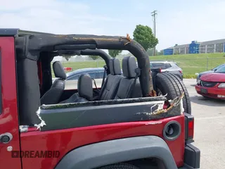 2013 Jeep Wrangler Sport z VIN 1C4GJWAG0DL543850, wystawiony jako IAAI lot #42374916 z przebiegiem 163 977 mil mil oraz . Historia ofert i sprzedaży dostępna na DreamBid. Obrazek 6.