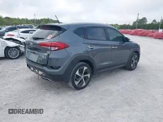 2016 Hyundai Tucson Limited with VIN KM8J33A27GU245096, listed as a IAAI auction lot 41961905 with 101,195 mi miles. Bid and sale history available at carsss.com. Image 4.