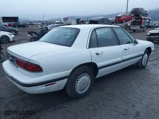 1997 Buick LeSabre Custom with VIN 1G4HP52K9VH552434, listed as a IAAI auction lot 41194261 with 102,633 mi miles. Bid and sale history available at carsss.com. Image 4.