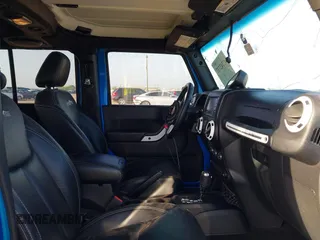 2014 Jeep Wrangler Unlimited Sahara with VIN 1C4HJWEG1EL188445, listed as a IAAI auction lot 42742737 with 79,948 mi miles and . Bid and sale history available at DreamBid. Image 5.