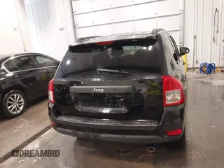 2014 Jeep Compass Sport with VIN 1C4NJCBA3ED777881, listed as a IAAI auction lot 41845518 with 113,566 mi miles. Bid and sale history available at carsss.com. Image 17.