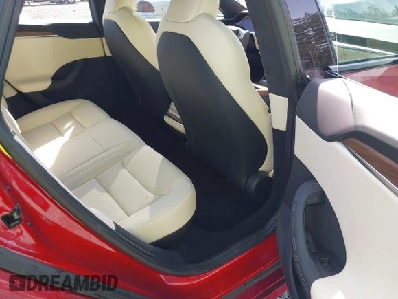 2023 Tesla Model S with VIN 5YJSA1E5XPF516779, listed as a IAAI auction lot 42110737 with 16,465 mi miles and . Bid and sale history available at DreamBid. Image 8.