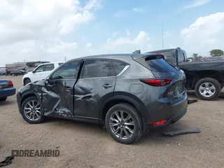 2021 Mazda CX-5 Grand Touring with VIN JM3KFBDM2M0431484, listed as a IAAI auction lot 42547665 with 34,757 mi miles and . Bid and sale history available at DreamBid. Image 15.