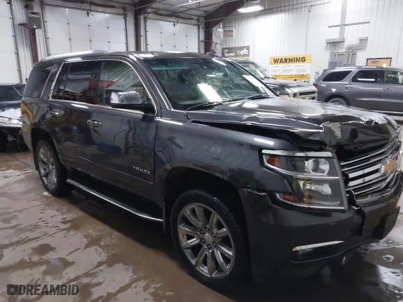 2016 Chevrolet Tahoe LTZ with VIN 1GNSKCKC7GR455033, listed as a IAAI auction lot 40811560 with 165,845 mi miles. Bid and sale history available at carsss.com. Image 1.