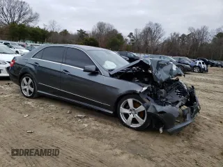 2011 Mercedes-Benz E 350 Luxury with VIN WDDHF8HB9BA454708, listed as a Copart auction lot 40143184 with 168,990 mi miles and Salvage Title. Bid and sale history available at DreamBid. Image 4.