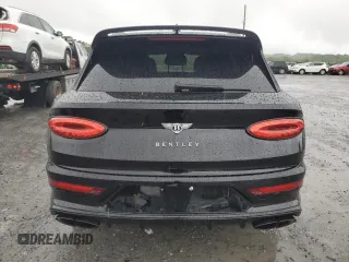 2022 Bentley Bentayga V8 z VIN SJAAM2ZV8NC039607, wystawiony jako Copart lot #54888564 z przebiegiem 15 561 mil mil oraz . Historia ofert i sprzedaży dostępna na DreamBid. Obrazek 6.
