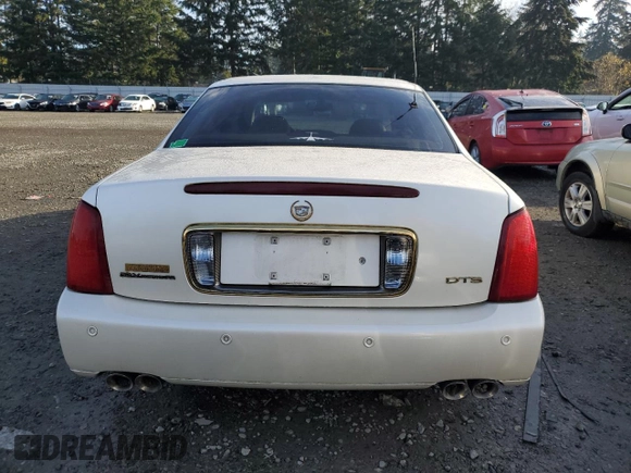 2002 Cadillac DeVille DTS with VIN 1G6KF57972U298182, listed as a Copart auction lot 80925674 with 89,416 mi miles and Salvage Title. Bid and sale history available at carsss.com. Image 6.
