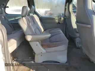 2000 Plymouth Voyager z VIN 2P4GP2534YR645983, wystawiony jako Copart lot #80028904 z przebiegiem Nie podano mil oraz Szkody całkowita. Historia ofert i sprzedaży dostępna na DreamBid. Obrazek 11.
