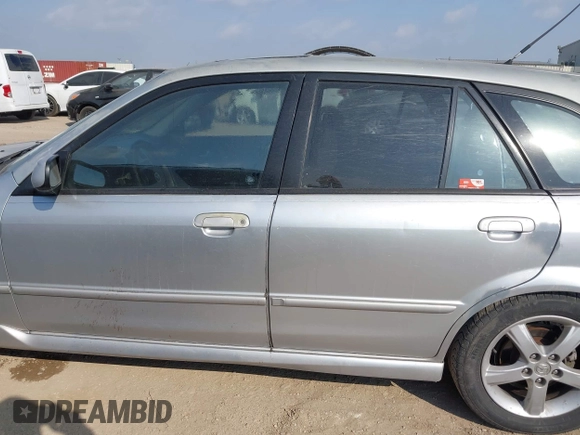 2003 Mazda Protege with VIN JM1BJ245031218333, listed as a IAAI auction lot 42070471 with 181,748 mi miles and . Bid and sale history available at DreamBid. Image 14.