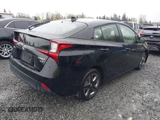 2022 Toyota Prius L Eco with VIN JTDKAMFU2N3154674, listed as a IAAI auction lot 41977505 with 61,552 mi miles and . Bid and sale history available at DreamBid. Image 4.