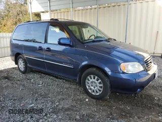 2003 Kia Sedona LX with VIN KNDUP131736448714, listed as a Copart auction lot 82308764 with 91,073 mi miles and Salvage Title. Bid and sale history available at carsss.com. Image 4.