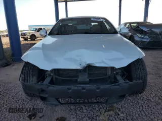 2013 BMW 3 Series 328i with VIN WBAKE3C56DE771233, listed as a Copart auction lot 83909034 with 141,535 mi miles and Salvage Title. Bid and sale history available at DreamBid. Image 5.