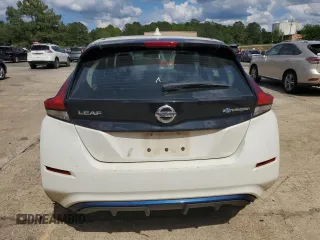2018 Nissan LEAF SV with VIN 1N4AZ1CP9JC302563, listed as a Copart auction lot 56521215 with 104,124 mi miles and Clean title. Bid and sale history available at DreamBid. Image 6.