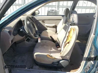 1999 Hyundai Accent z VIN KMHVD14N4XU456698, wystawiony jako Copart lot #41733345 z przebiegiem 197 574 mil mil oraz Szkody całkowita. Historia ofert i sprzedaży dostępna na DreamBid. Obrazek 7.
