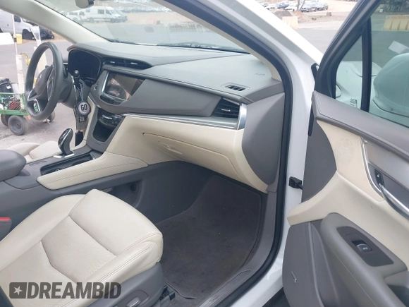 2017 Cadillac XT5 Premium Luxury FWD with VIN 1GYKNCRS4HZ128145, listed as a IAAI auction lot 42349980 with 99,100 mi miles and . Bid and sale history available at DreamBid. Image 5.