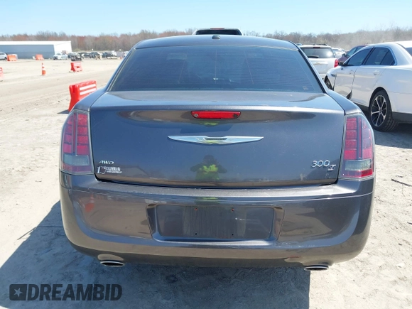 2014 Chrysler 300 with VIN 2C3CCAGG2EH384383, listed as a IAAI auction lot 42044047 with 114,271 mi miles. Bid and sale history available at carsss.com. Image 16.