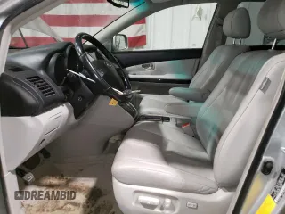 2008 Lexus RX 400h with VIN JTJHW31UX82050681, listed as a Copart auction lot 51549455 with 63,296 mi miles and Salvage Title. Bid and sale history available at DreamBid. Image 7.