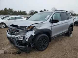 2023 Honda Passport TrailSport z VIN 5FNYF8H64PB044233, wystawiony jako Copart lot #53522015 z przebiegiem 10 458 mil mil oraz Szkoda całkowita • Salvage title. Historia ofert i sprzedaży dostępna na DreamBid. Obrazek 1.