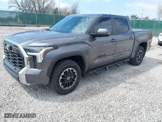2024 Toyota Tundra 4WD SR5 with VIN 5TFLA5DB6RX177580, listed as a IAAI auction lot 41874283 with 6,880 mi miles. Bid and sale history available at carsss.com. Image 2.