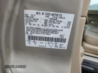 2012 Ford Escape XLT z VIN 1FMCU9DG1CKC74602, wystawiony jako Copart lot #57764325 z przebiegiem 153 872 mil mil oraz Szkoda całkowita • Salvage title. Historia ofert i sprzedaży dostępna na DreamBid. Obrazek 13.