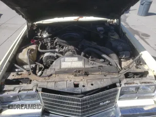 1984 Cadillac Eldorado z VIN 1G6AL578XEE621800, wystawiony jako Copart lot #72058714 z przebiegiem 50 757 mil mil oraz Tytuł czysty. Historia ofert i sprzedaży dostępna na DreamBid. Obrazek 11.