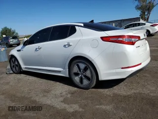 2013 Kia Optima Hybrid EX with VIN KNAGM4ADXD5060028, listed as a Copart auction lot 69083304 with 119,701 mi miles and Salvage Title. Bid and sale history available at carsss.com. Image 2.