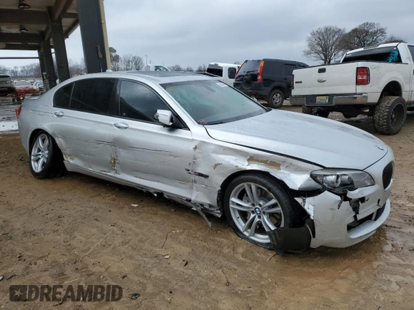 2012 BMW 7 Series 740Li with VIN WBAKB4C50CC576043, listed as a Copart auction lot 42060065 with 142,017 mi miles and Salvage Title. Bid and sale history available at carsss.com. Image 4.