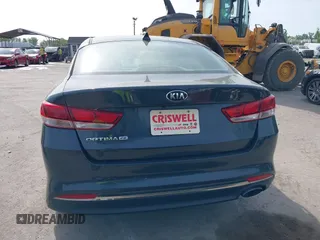 2016 Kia Optima LX with VIN KNAGT4L37G5073752, listed as a IAAI auction lot 42132621 with 136,818 mi miles. Bid and sale history available at carsss.com. Image 16.