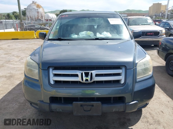2006 Honda Pilot LX with VIN 2HKYF18146H556070, listed as a IAAI auction lot 42011915 with 145,112 mi miles and . Bid and sale history available at DreamBid. Image 6.