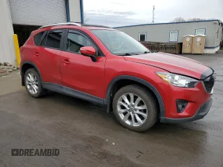 2015 Mazda CX-5 Grand Touring with VIN JM3KE4DY3F0510425, listed as a Copart auction lot 51784295 with 138,147 mi miles and Clean Title. Bid and sale history available at carsss.com. Image 4.