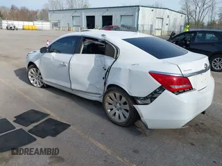 2014 Buick LaCrosse Leather with VIN 1G4GC5G32EF207671, listed as a IAAI auction lot 42106439 with 164,030 mi miles and . Bid and sale history available at DreamBid. Image 3.