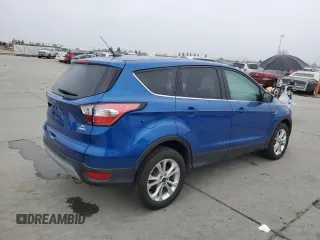 2017 Ford Escape SE with VIN 1FMCU9GDXHUC51686, listed as a Copart auction lot 84412734 with 96,234 mi miles and Clean Title. Bid and sale history available at DreamBid. Image 3.
