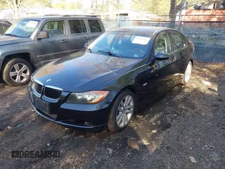 2006 BMW 3 Series 325i with VIN WBAVB13546KR57268, listed as a IAAI auction lot 42002464 with 210,663 mi miles. Bid and sale history available at carsss.com. Image 2.