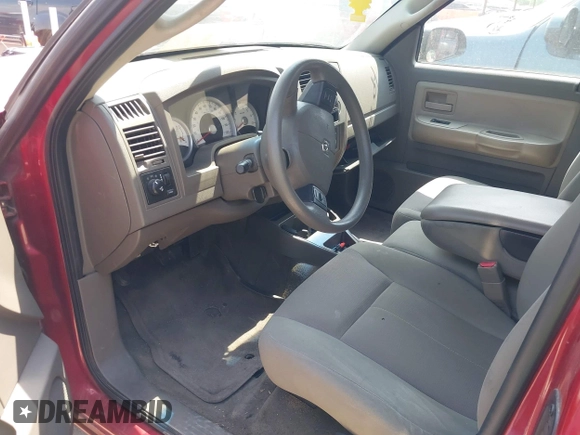 2006 Dodge Dakota SLT z VIN 1D7HE42N66S629432, wystawiony jako IAAI lot #42319636 z przebiegiem 187 086 mil mil oraz . Historia ofert i sprzedaży dostępna na DreamBid. Obrazek 12.