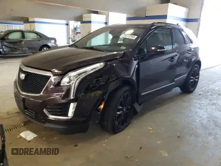 2021 Cadillac XT5 AWD Sport z VIN 1GYKNGRS5MZ165836, wystawiony jako Copart lot #77872264 z przebiegiem 46 065 mil mil oraz Szkoda całkowita • Salvage title. Historia ofert i sprzedaży dostępna na DreamBid. Obrazek 1.
