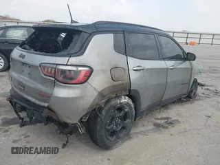 2024 Jeep Compass Trailhawk with VIN 3C4NJDDN5RT588722, listed as a IAAI auction lot 42177559 with Not provided miles and . Bid and sale history available at DreamBid. Image 4.