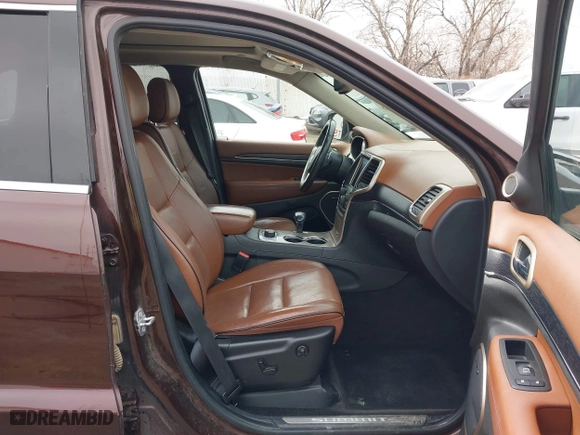 2015 Jeep Grand Cherokee Summit with VIN 1C4RJFJT7FC840560, listed as a IAAI auction lot 41596868 with 173,392 mi miles. Bid and sale history available at carsss.com. Image 5.