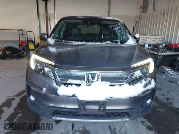 2021 Honda Pilot EX-L with VIN 5FNYF6H56MB037761, listed as a IAAI auction lot 41154468 with 61,159 mi miles. Bid and sale history available at carsss.com. Image 12.