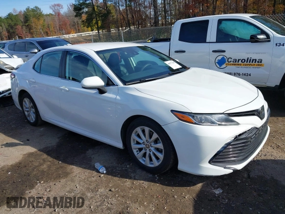 2020 Toyota Camry LE with VIN 4T1C11AKXLU986310, listed as a IAAI auction lot 40977100 with 108,208 mi miles and . Bid and sale history available at DreamBid. Image 1.